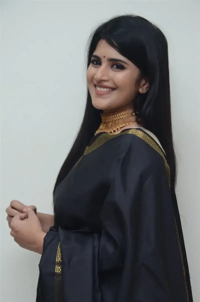 Megha Akash in Black Saree at Manu Charitra Telugu Movie Trailer Launch